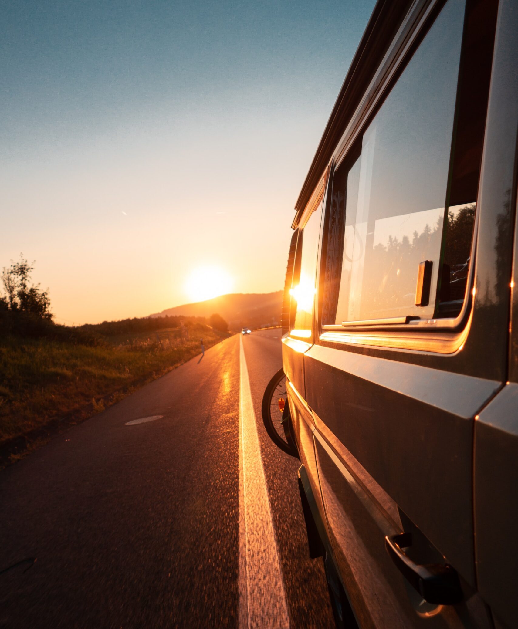 Photo of camper van with bicycle